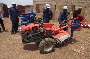 Habgito Engineers guiding the trainee to drive the smart tractor